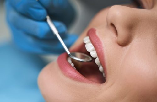 dentist-is-examining-young-woman-stock-photo-2021-09-03-15-40-35-utc